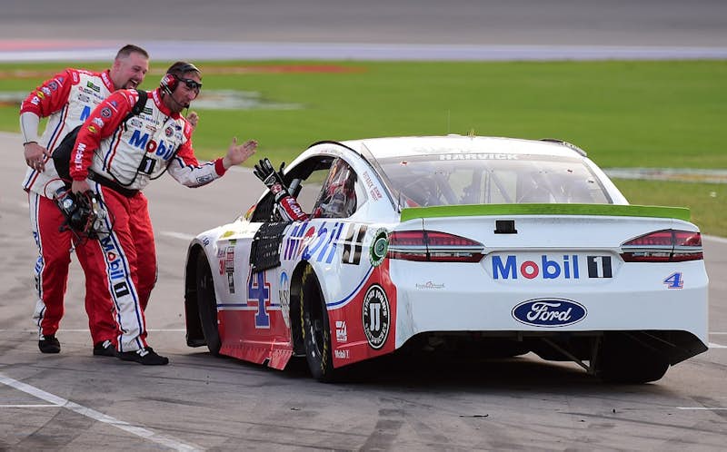 Harvick chases down Truex to win at TMS, clinch berth in finale